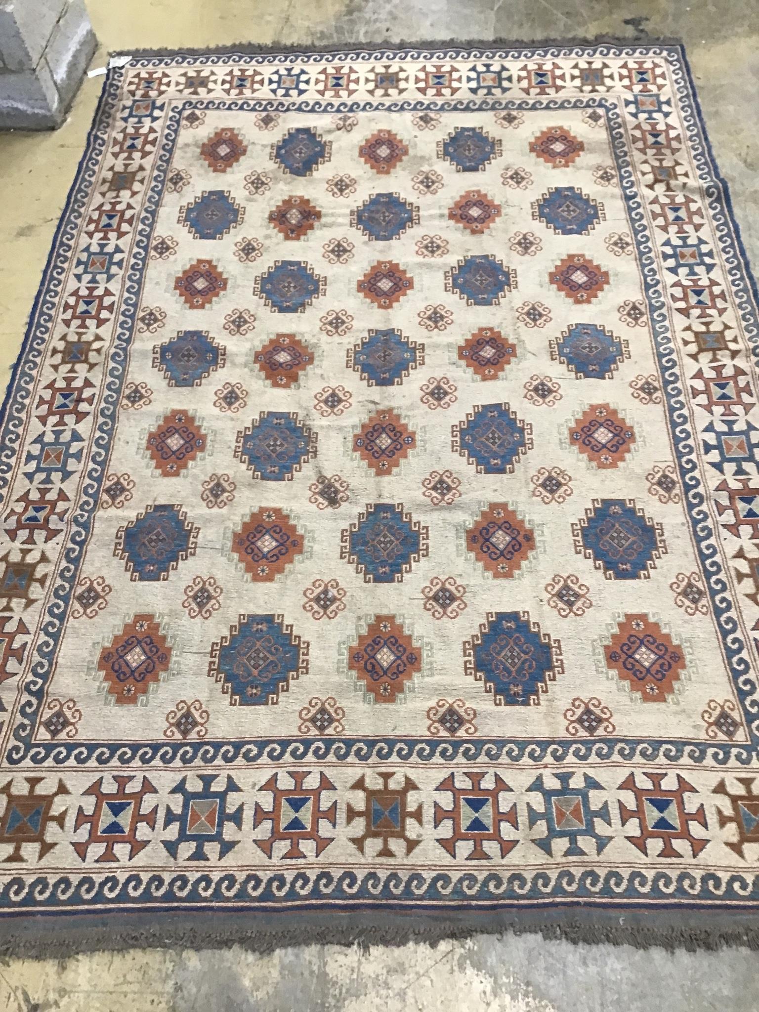 A Soumak ivory ground carpet, 329 x 227cm